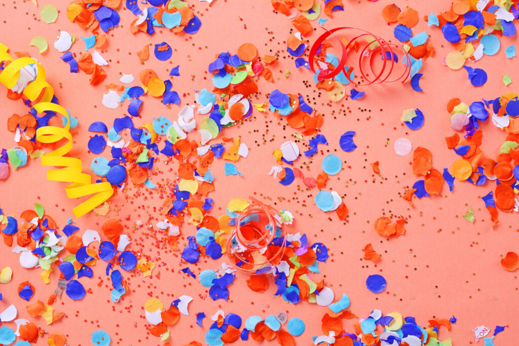 Top view of colorful party confetti background