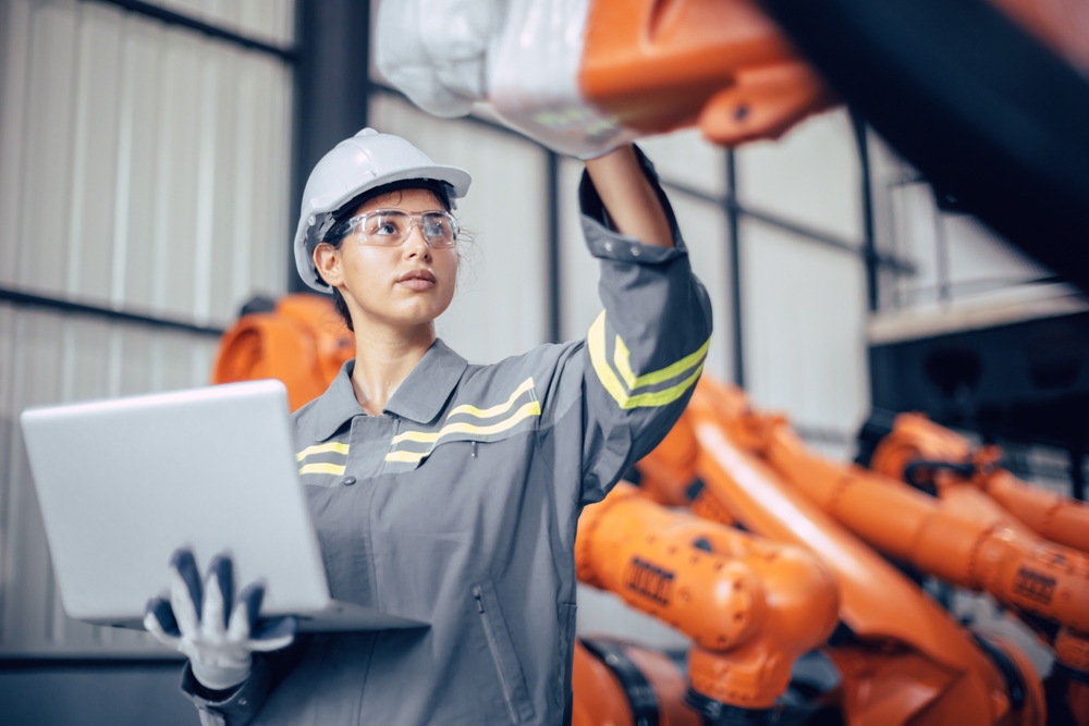 Female manufacturing engineer working at a factory